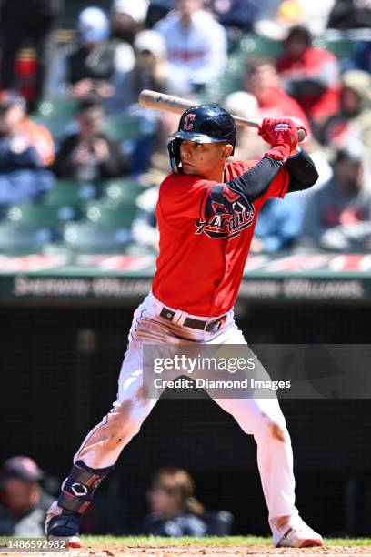 Andrés Giménez of the Cleveland Guardians bats during fourth inning against the Colorado Rockies at Progressive Field on April 26, 2023 in Cleveland,...