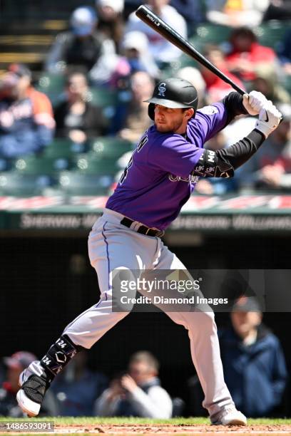 Ryan McMahon of the Colorado Rockies bats during fourth inning against the Cleveland Guardians at Progressive Field on April 26, 2023 in Cleveland,...