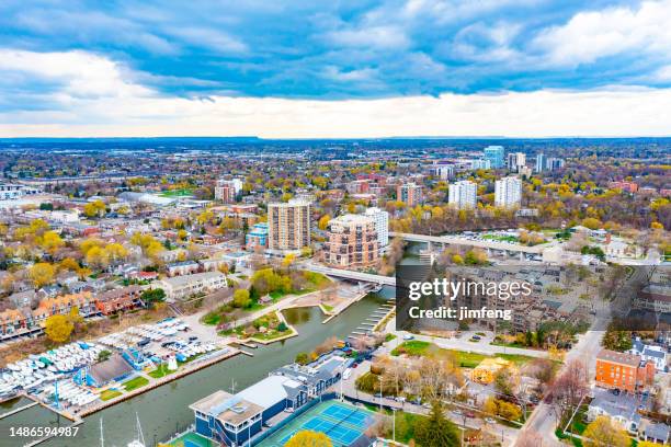 aerial townscape and sixteen mile creek, oakville, canada - oakville ontario stockfoto's en -beelden