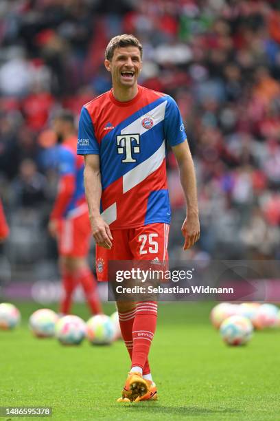 Thomas Müller of FC Bayern München laughs during warm-up prior to the Bundesliga match between FC Bayern München and Hertha BSC at Allianz Arena on...
