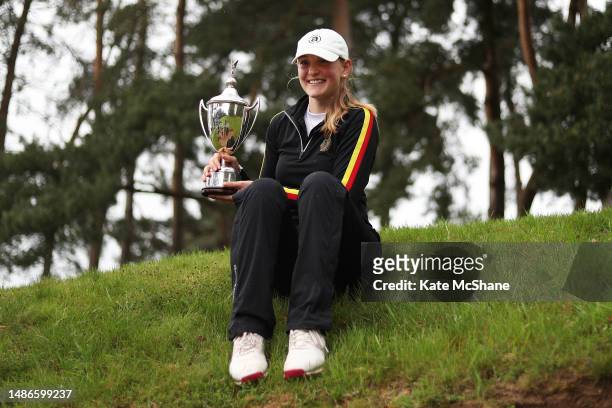 Champion, Antonia Steiner of Germany celebrates with the Angela Uzielli Trophy on Day Three of the R&A Girls U16 Amateur Championship at Enville Golf...