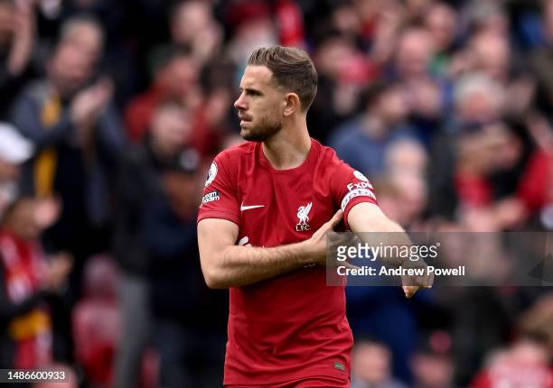 Jordan Henderson captain of Liverpool adjusting his captains armband during the Premier League match between Liverpool FC and Tottenham Hotspur at...