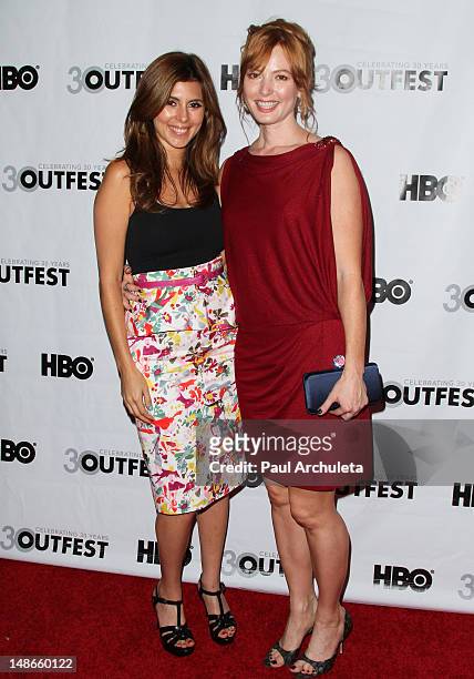 Actors Jamie-Lynn Sigler and Alicia Witt attend the premiere of "I Do" for the 2012 Outfest at the John Anson Ford Amphitheatre on July 18, 2012 in...
