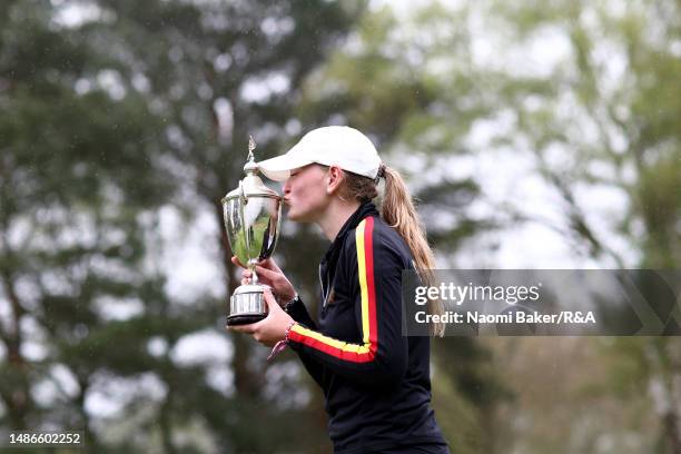 Champion, Antonia Steiner of Germany celebrates with the Angela Uzielli Trophy on Day Three of the R&A Girls U16 Amateur Championship at Enville Golf...