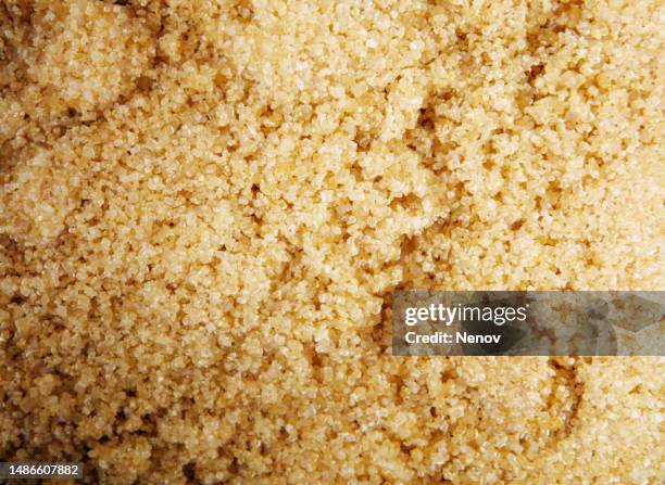 close-up of brown sugar crystals background - glucose molecule stock pictures, royalty-free photos & images