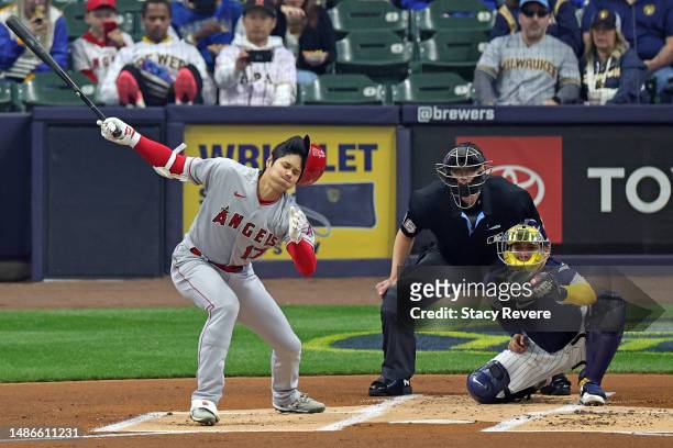 Shohei Ohtani of the Los Angeles Angels strikes out during the first inning against the Milwaukee Brewers at American Family Field on April 30, 2023...