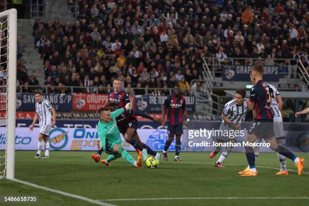 Lukasz Skorupski of Bologna FC makes a save to deny Nicolo Fagioli of Juventus a goal during the Serie A match between Bologna FC and Juventus at...