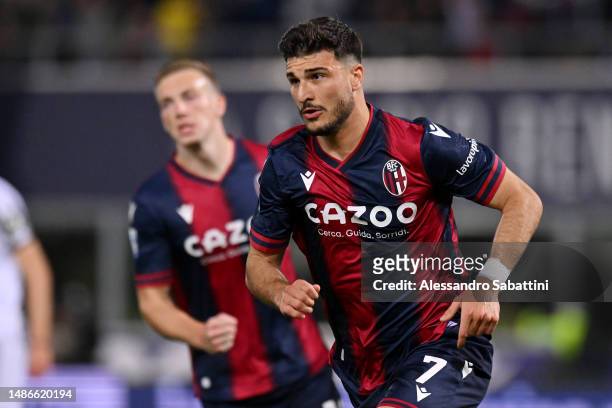 Riccardo Orsolini of Bologna FC celebrates after scoring the team's first goal during the Serie A match between Bologna FC and Juventus at Stadio...