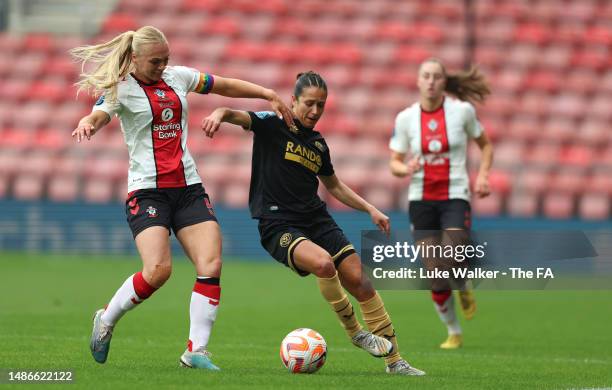 Katie Wilkinson of Southampton FC battles for possession with Bex Rayner of Sheffield United during the Barclays FA Women's Championship match...
