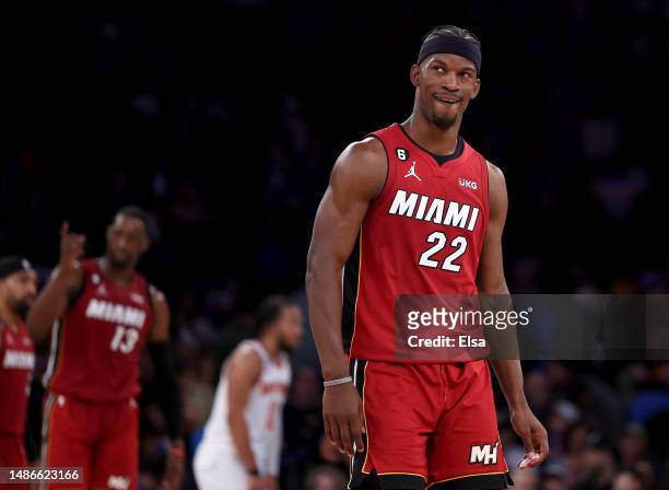Jimmy Butler of the Miami Heat reacts late in the fourth quarter against the New York Knicks during game one of the Eastern Conference Semifinals at...