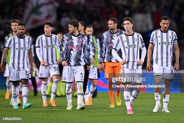 Fabio Miretti and Danilo of Juventus look dejected after the Serie A match between Bologna FC and Juventus at Stadio Renato Dall'Ara on April 30,...