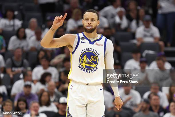 Stephen Curry of the Golden State Warriors gestures during the third quarter in game seven of the Western Conference First Round Playoffs against the...