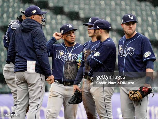 Kevin Cash of the Tampa Bay Rays visits the mound for a pitching change during the ninth inning of a game against the Chicago White Sox at Guaranteed...