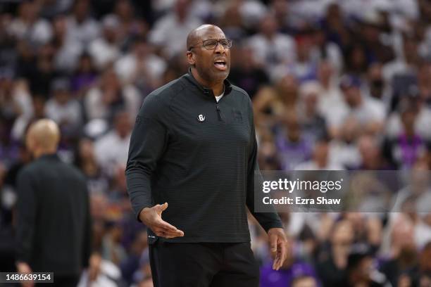 Head coach Mike Brown of the Sacramento Kings reacts during game seven of the Western Conference First Round Playoffs against the Golden State...