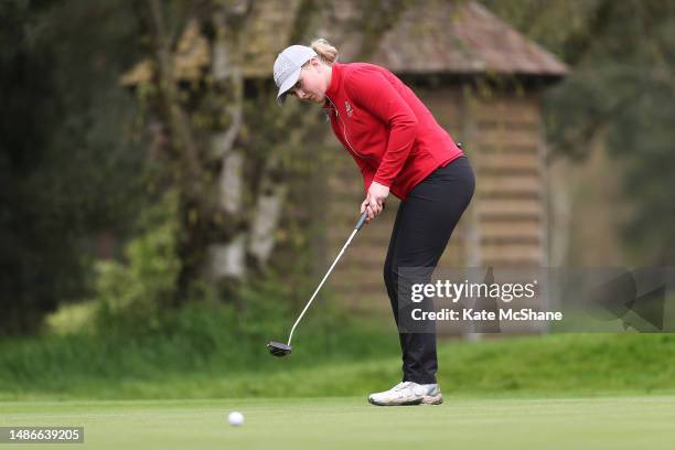 Sadie Adams of Royal Birkdale putts on the 18th green on Day Three of the R&A Girls U16 Amateur Championship at Enville Golf Club on April 30, 2023...