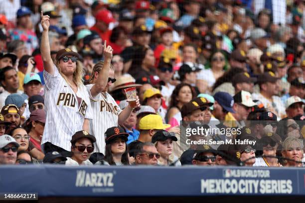 San Diego Padres fans cheer during the fifth inning of game two for the MLB World Tour Mexico City Series against the San Francisco Giants at Alfredo...