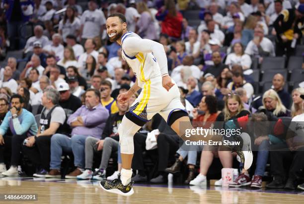 Stephen Curry of the Golden State Warriors reacts during the fourth quarter in game seven of the Western Conference First Round Playoffs against the...