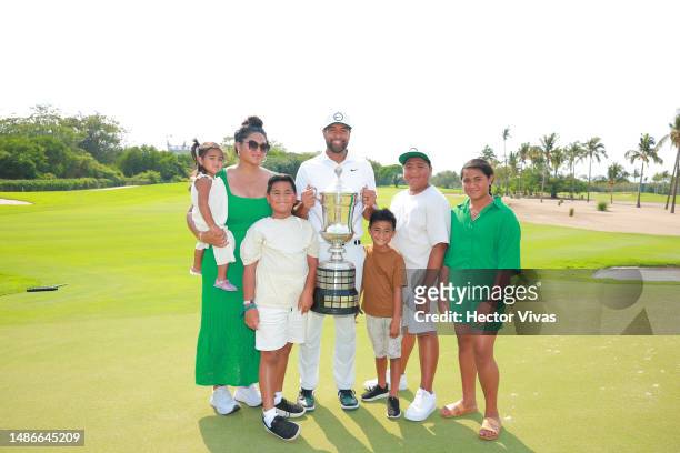 Tony Finau of the United States, his wife Alyna and their children pose for a picture after the final round of the Mexico Open at Vidanta on April...