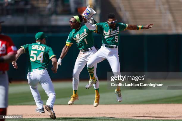 Esteury Ruiz of the Oakland Athletics celebrates after hitting a walk-off single in the bottom of the ninth inning against the Cincinnati Reds at...
