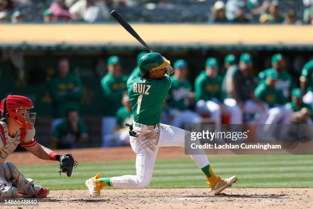 Esteury Ruiz of the Oakland Athletics hits a walk-off single in the bottom of the ninth inning against the Cincinnati Reds at RingCentral Coliseum on...