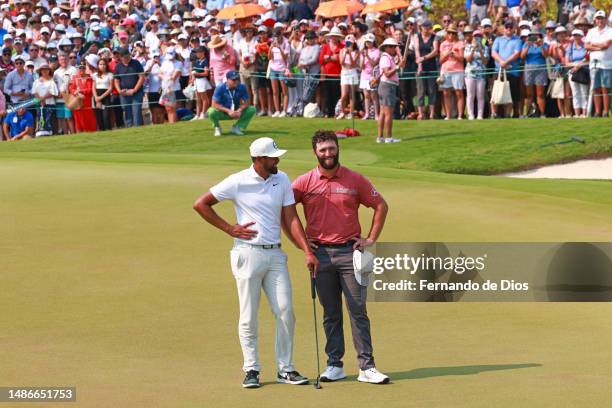 Tony Finau of the United States talks to Jon Rahm of Spain after winning the Mexico Open at Vidanta on April 30, 2023 in Puerto Vallarta, Jalisco.