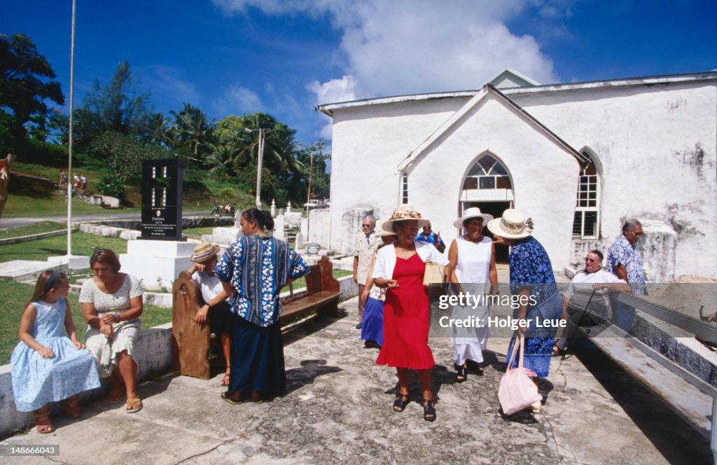 People leaving Sunday mass.