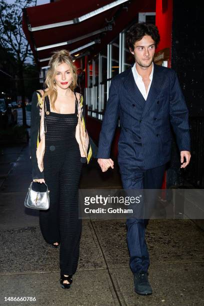 Sienna Miller and Oli Green are seen arriving for a pre-Met Gala dinner hosted by Anna Wintour in SoHo on April 30, 2023 in New York City.