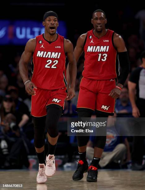 Jimmy Butler and Bam Adebayo of the Miami Heat celebrate in the second half of game one of the Eastern Conference Semifinals against the New York...