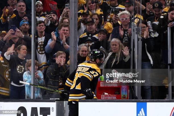 Patrice Bergeron of the Boston Bruins exits the ice after Florida Panthers defeat the Bruins 4-3 in overtime of Game Seven of the First Round of the...
