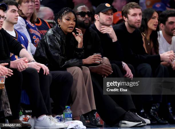 Gabrielle Union and Dwyane Wade attend game one of the Eastern Conference Semifinals between the New York Knicks and the Miami Heat at Madison Square...