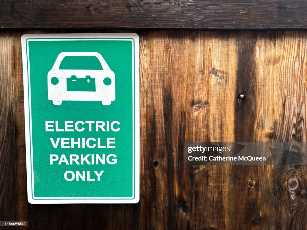 Electric vehicle (EV) parking sign