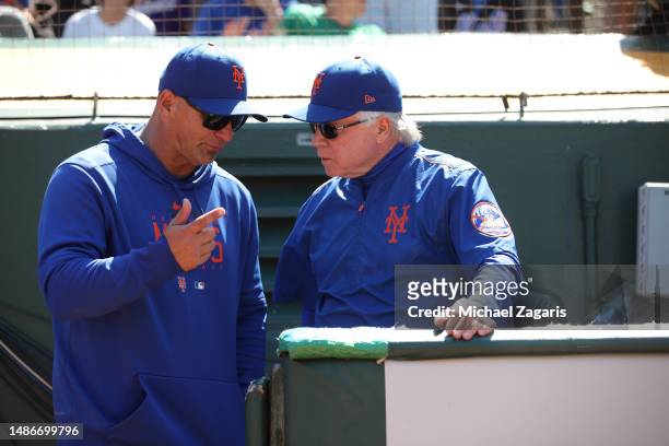Bench Coach Eric Chavez and Manager Buck Showalter of the New York Mets in the dugout during the game against the Oakland Athletics at RingCentral...