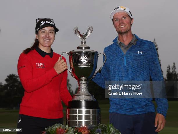 Hannah Green of Australia poses with the trophy and caddie Nate Blasko after victory during the final round of the JM Eagle LA Championship presented...