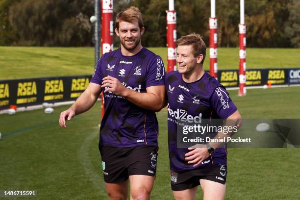 Christian Welch and Harry Grant of the Storm share a laugh a Melbourne Storm NRL training session at Moorabbin Oval on May 01, 2023 in Melbourne,...