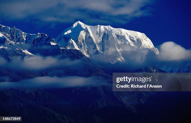 annapurna iii (7555m) from sarangkot. - annapurna range stock pictures, royalty-free photos & images