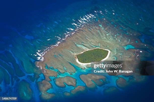 aerial of small island in the vava'u group. - tonga stock pictures, royalty-free photos & images