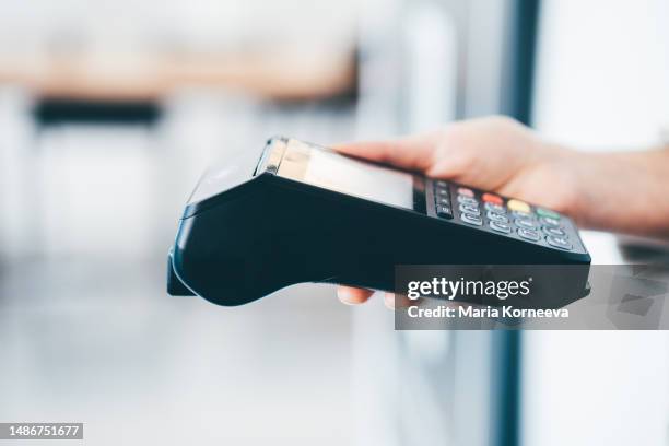 close up of mobile gprs card machine for payment. - credit card reader stock pictures, royalty-free photos & images