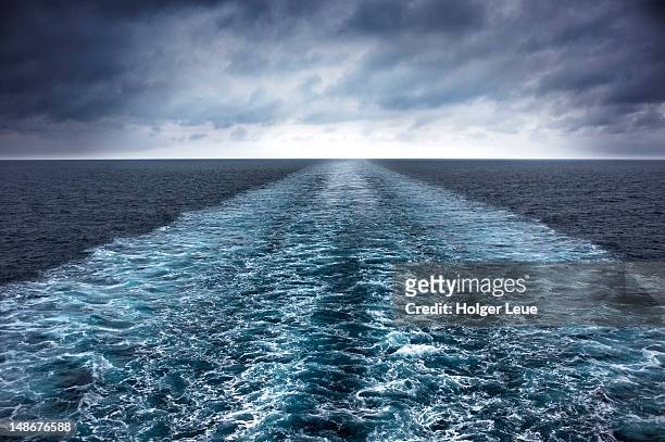wake of cruiseship ms delphin during adriatic sea voyage. - verboten stockfoto's en -beelden