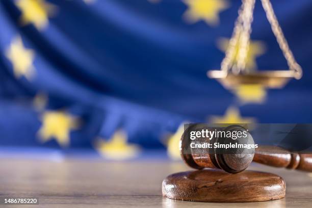 eu legal requirements and system of law with symbols of jurisdiction. - gesetzgeber stock-fotos und bilder