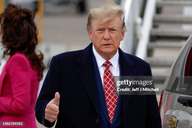 Former U.S. President Donald Trump disembarks his plane "Trump Force One" at Aberdeen Airport on May 1, 2023 in Aberdeen, Scotland. Former U.S....