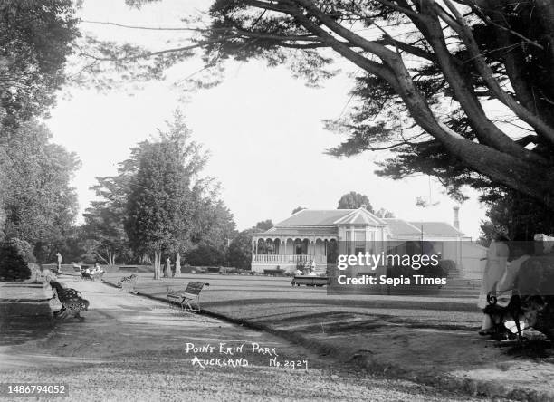 Tea Kiosk at Point Erin Park, Auckland, New Zealand, View of the tea kiosk in Point Erin Park, Herne Bay. People are sitting on garden seats nearby....