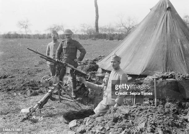 A New Zealand soldier at a French machine gun post, World War I, A ...