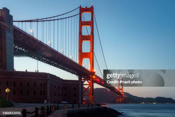 famous golden gate bridge in san francisco at night seen from east battery viewpoint in california, usa - golden gate bridge night 個照片及圖片檔