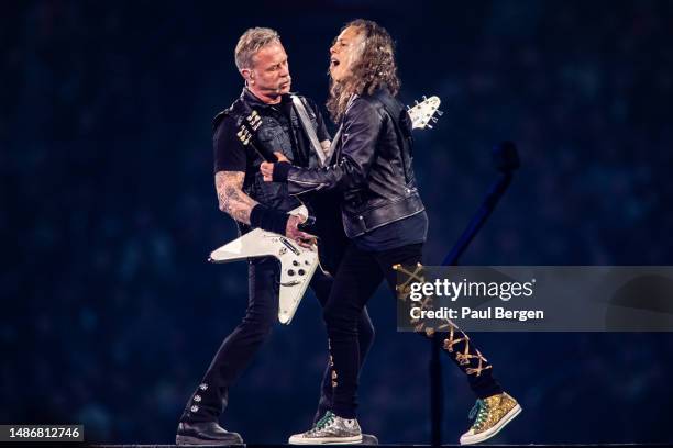 James Hetfield and Kirk Hammett of Metallica perform on stage at Johan Cruijff Arena on April 29, 2023 in Amsterdam, Netherlands.
