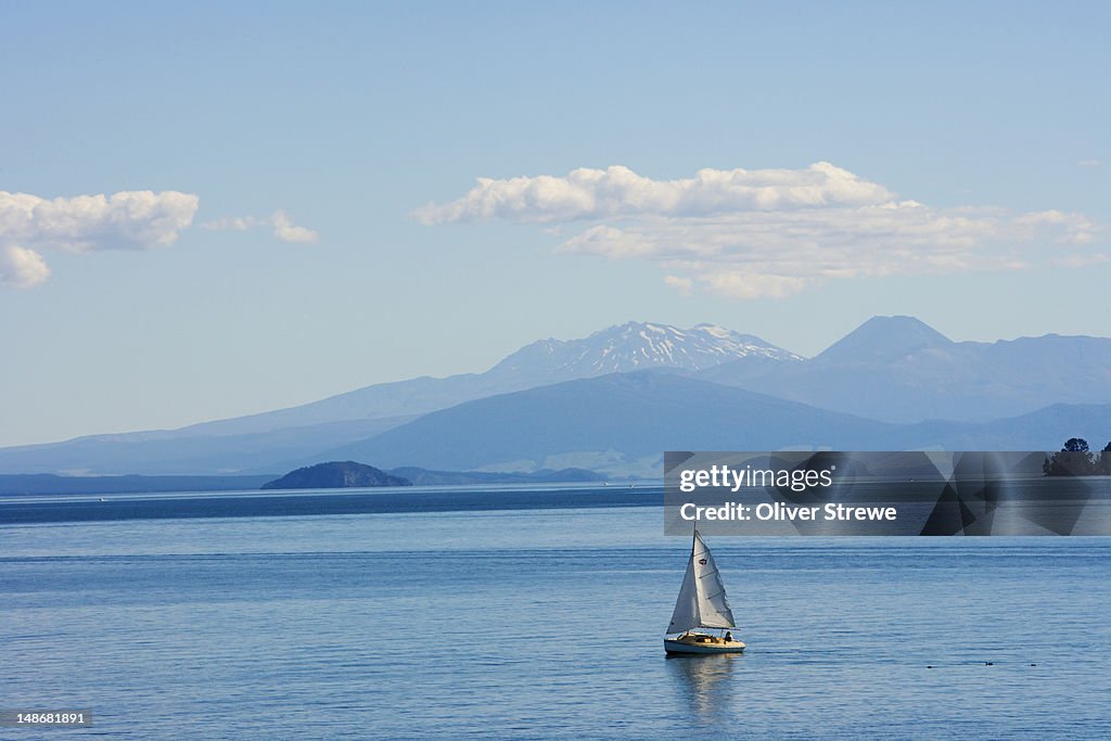 Yacht on Lake Taupo with Mount Ruapehu in the background.