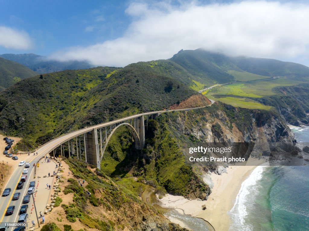 Bixby Bridge with Pacific coast highway 1 road is a scenic road that stretches along the California coast from Dana Point in Orange County to Leggett in Mendocino County in California, USA.