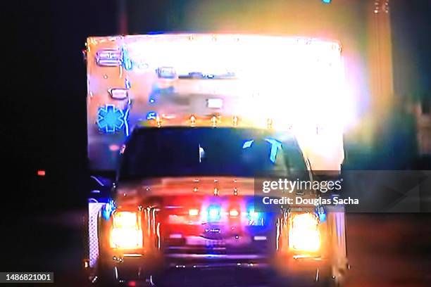 approaching medic in a ambulance - ambulance stock pictures, royalty-free photos & images
