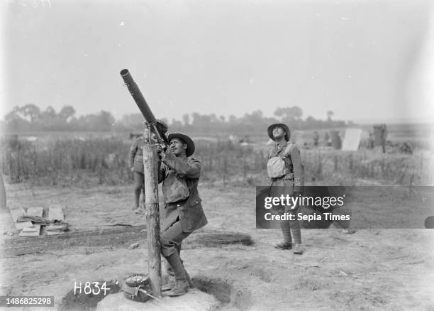 Soldiers on the anti-aircraft guard of the New Zealand Pioneer Maori Battalion camp, Bayencourt, France, Members of the New Zealand Pioneer Maori...