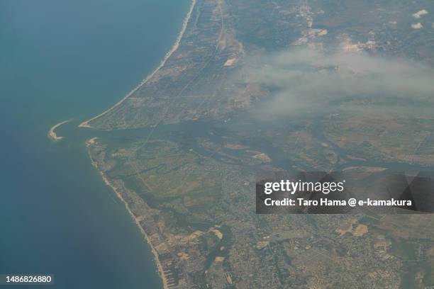 hoi an in quang nam of vietnam aerial view from airplane - south china sea stock pictures, royalty-free photos & images