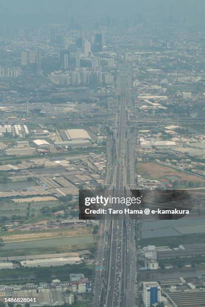 urban highway in samut prakan of thailand aerial view from airplane - samut prakan province stockfoto's en -beelden
